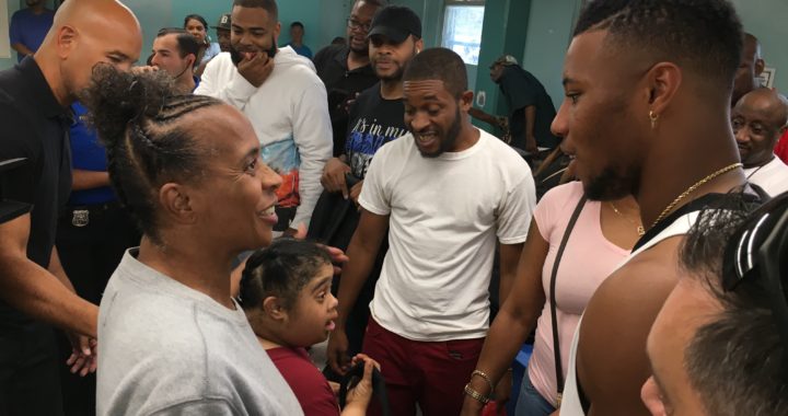 Iran and Saquon Barkley hold backpack giveaway at Patterson Houses