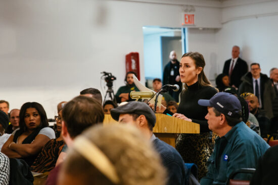 State Senator Alessandra Biaggi at a public hearing for the MTA's Bronx bus network redesign plan.