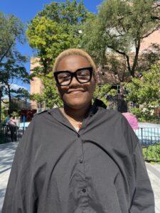 young woman wearing glasses on playground